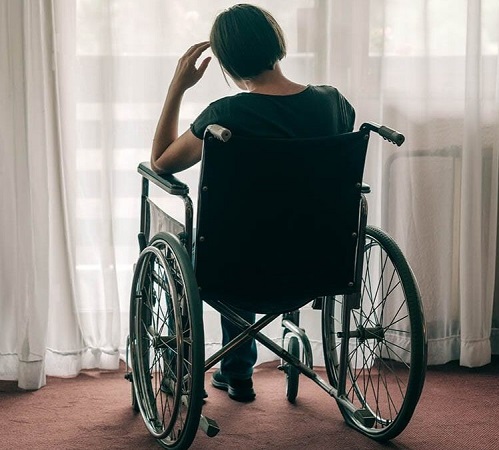 depressed person in a wheelchair